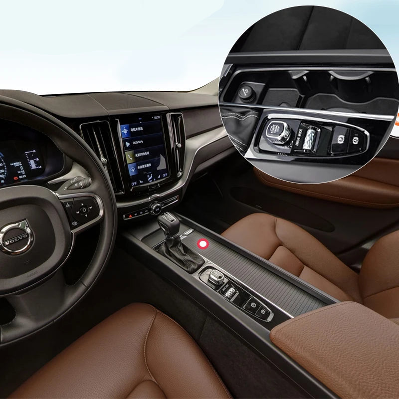 Car interior with focus on dashboard and steering wheel, featuring LINGLUYANG branding.