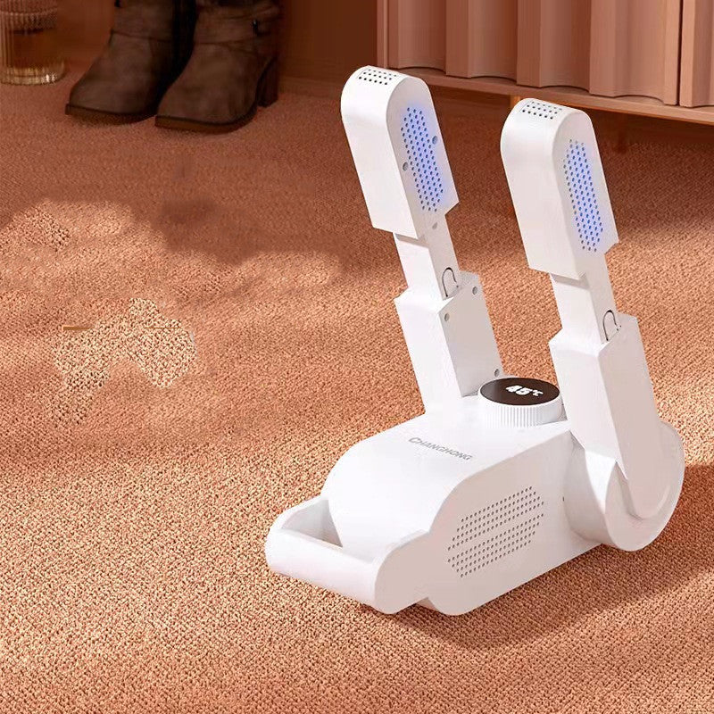 White shoe cleaning machine on a carpeted floor with shoes in the background.