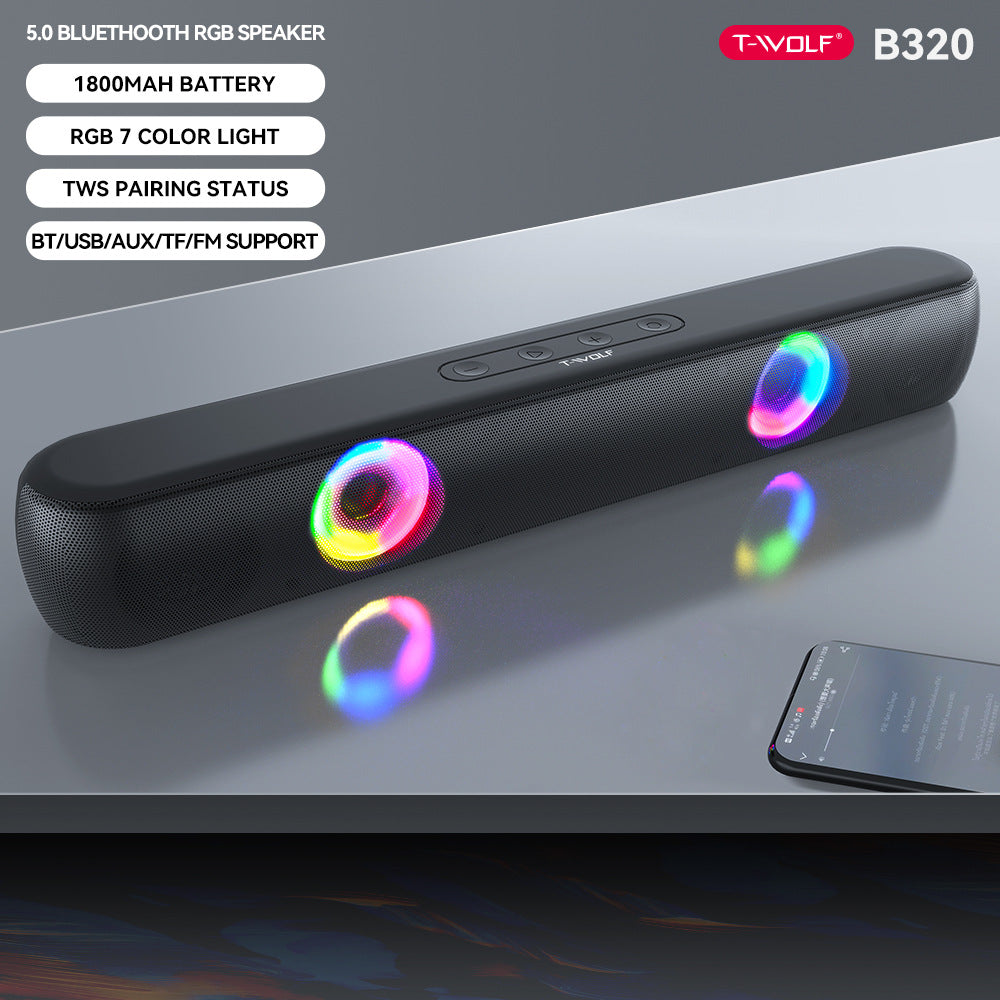 Black Bluetooth speaker with RGB lighting on a gray surface, featuring T-Wolf branding.