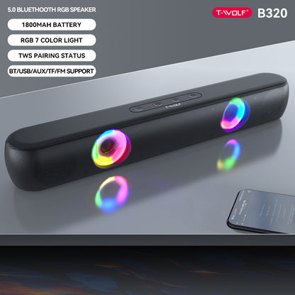 Black Bluetooth speaker with RGB lighting on a gray surface, featuring T-Wolf branding.