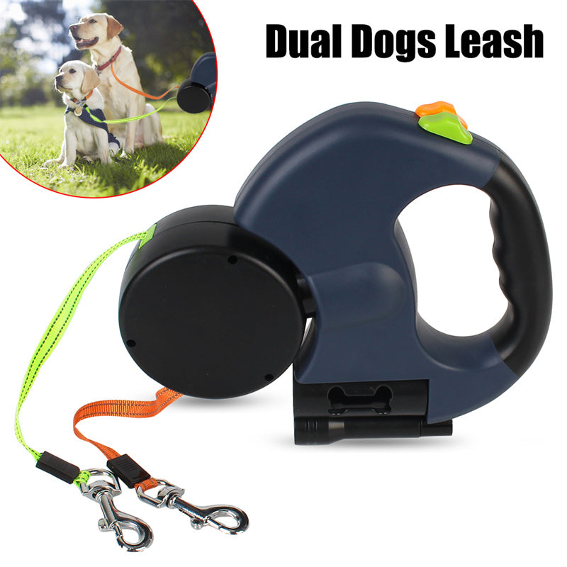 Retractable dog leash with dual handle for two dogs, shown with a white background.