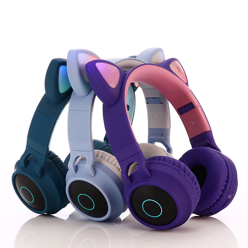Bluetooth 5.0 Wireless Stereo Headphones - Set of colorful headphones with cat ear design on a white background