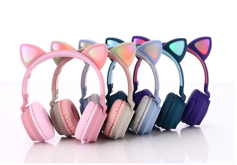 Bluetooth 5.0 Wireless Stereo Headphones - Colorful cat ear headphones arranged in a row on a white background