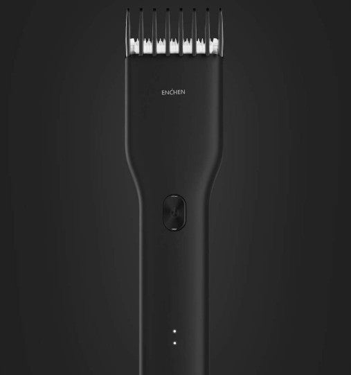Black hair trimmer with visible brand logo on a dark background