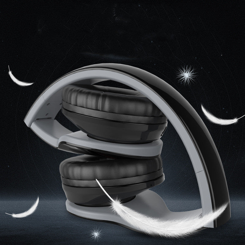 Wired Gaming Sports Headphones Headset - 
Black and gray headphones on a dark background with celestial elements