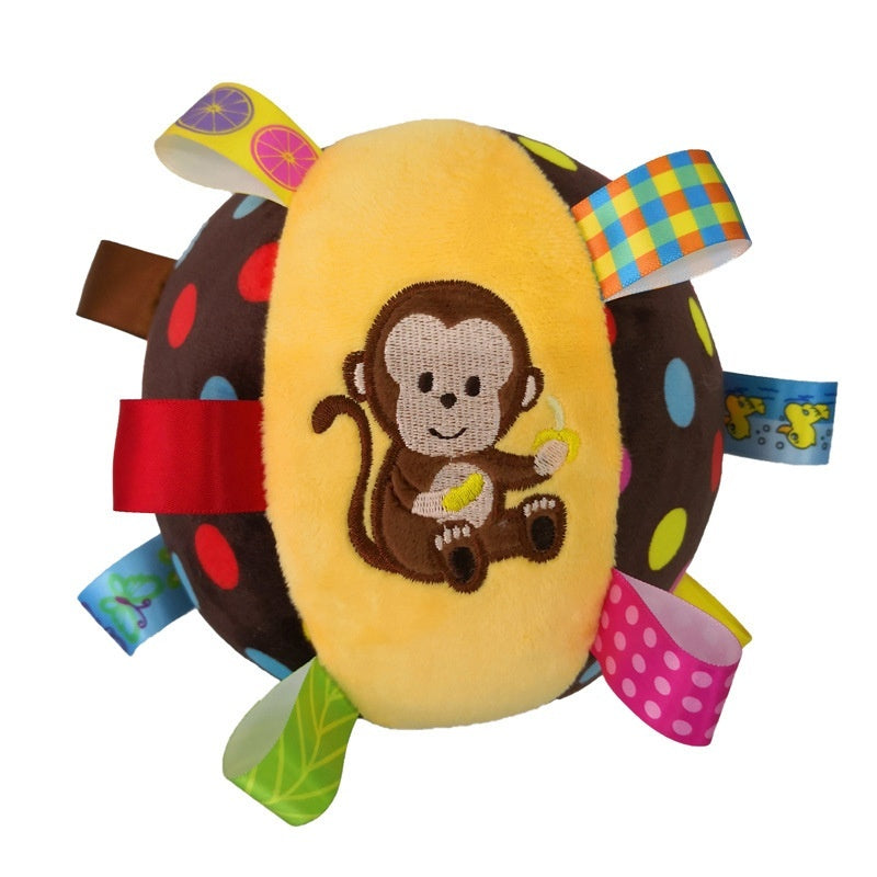 Colorful toy with a monkey design on a white background