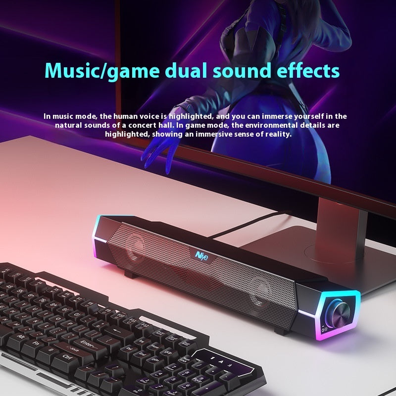 Sound bar with dual sound effects on a desk with keyboard and monitor