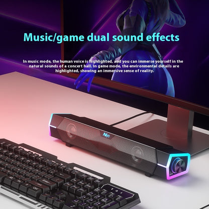 Sound bar with dual sound effects on a desk with keyboard and monitor