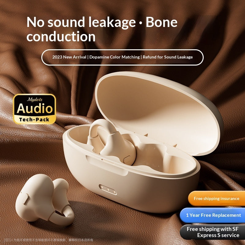 Ear Clip Bluetooth Wireless Headphones - Beige wireless earbuds with charging case on a brown fabric background, featuring text about sound leakage and bone conduction.