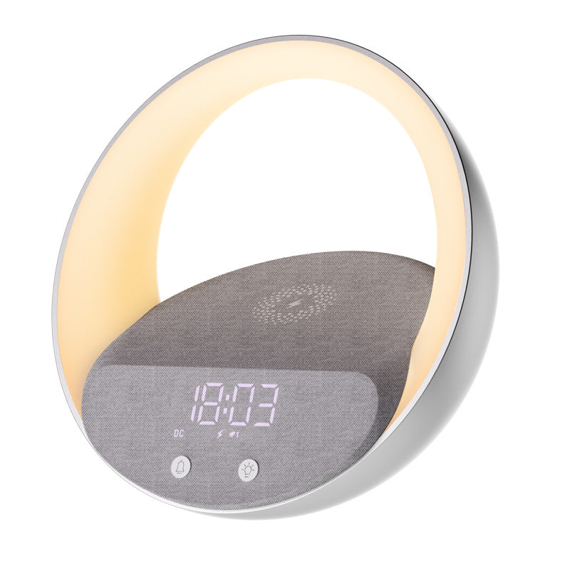 Round alarm clock with digital display on a white background