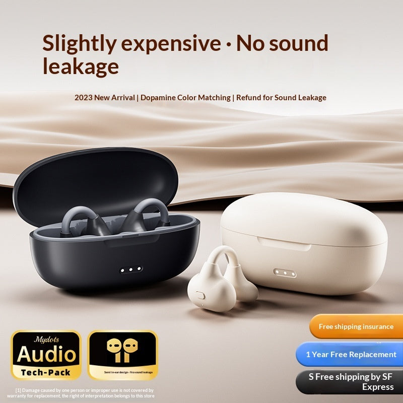 Ear Clip Bluetooth Wireless Headphones - Black and white wireless earbuds with charging case on a beige background