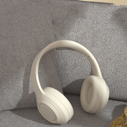 Noise Reduction Bluetooth Wireless Music Headset -
White headphones on a textured gray surface