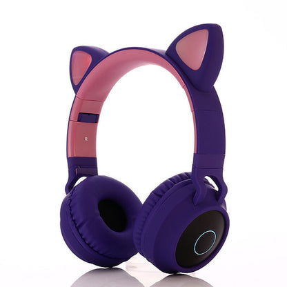 Bluetooth 5.0 Wireless Stereo Headphones - Purple headphones with cat ears on a white background