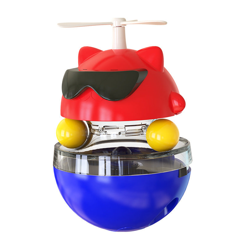 Colorful toy with a red top, yellow balls, and blue base on a white background