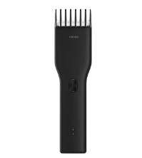 Black hair trimmer on a white background
