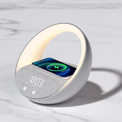 Modern digital clock with a circular design on a marble surface