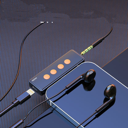 Wireless Neck-Mounted Monitor Studio Earphones - Headphones with a small device and USB cable on a reflective surface