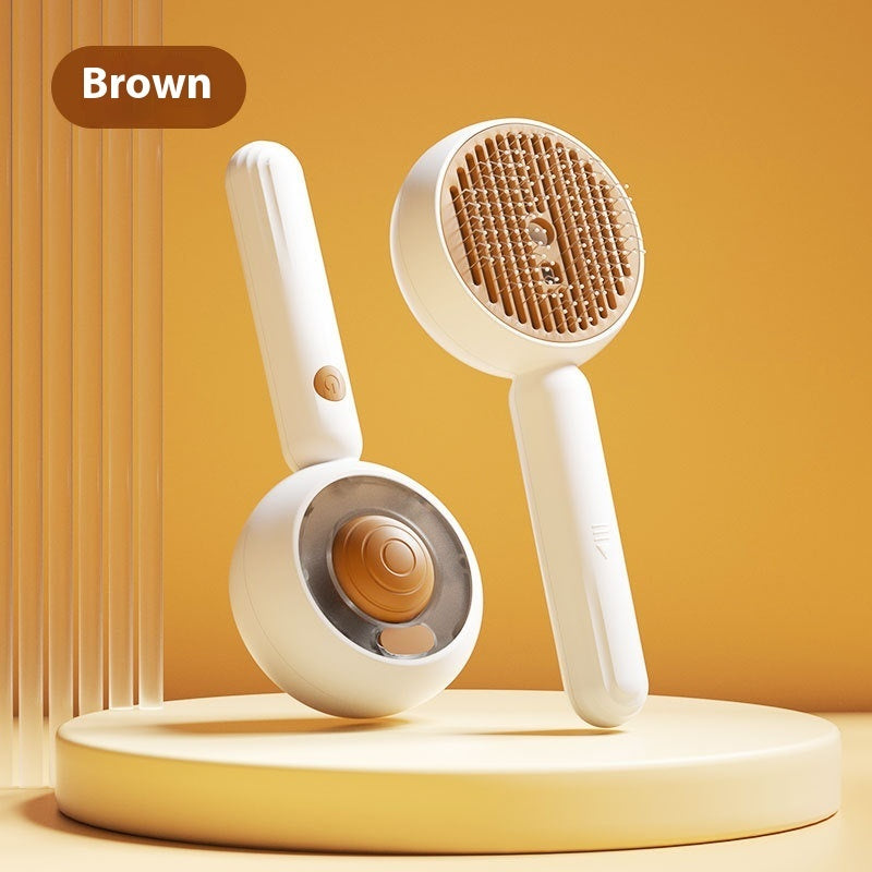 White handheld grooming brush with brown bristles on a yellow background