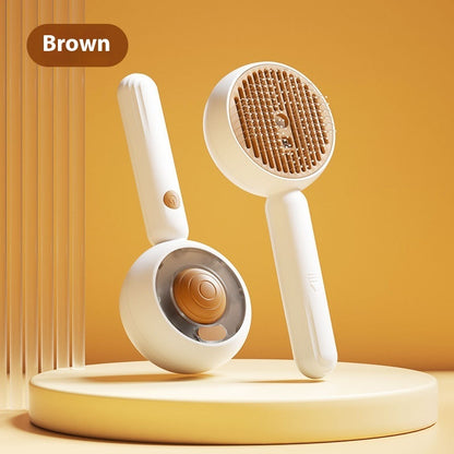 White handheld grooming brush with brown bristles on a yellow background