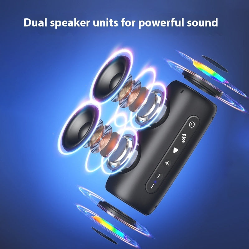 Black portable speaker with dual speaker units on a blue background
