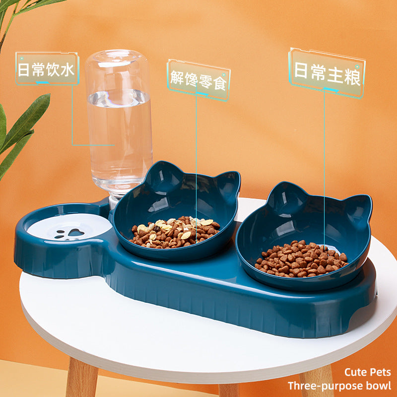 Blue pet feeding station with two bowls and a water bottle on a white stand against an orange background.