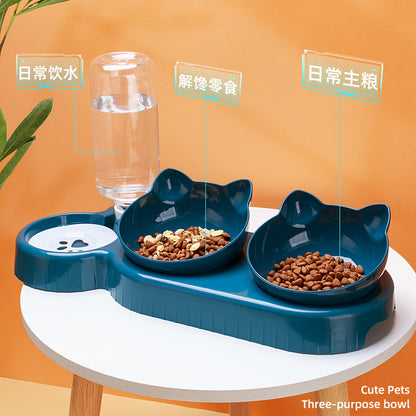 Blue pet feeding station with two bowls and a water bottle on a white stand against an orange background.