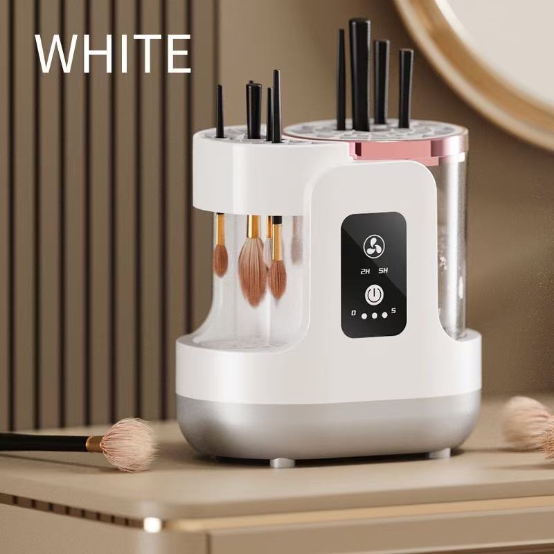 White brush cleaning machine with various brushes on a wooden surface