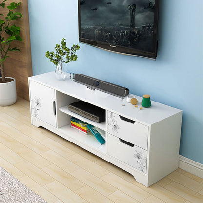 White TV stand with decorative items against a light blue wall.