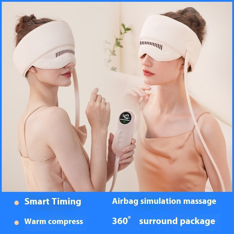 Woman using a white head massager with digital display, against a light background.
