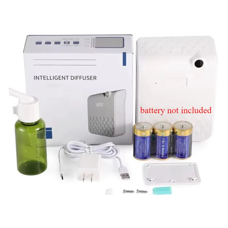 Intelligent diffuser set with bottle, packaging, batteries, and accessories on a white background.