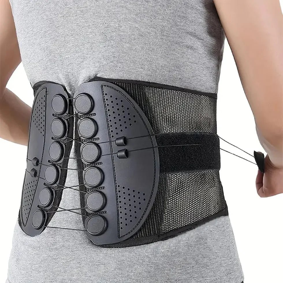 Black back brace worn by a person on a white background