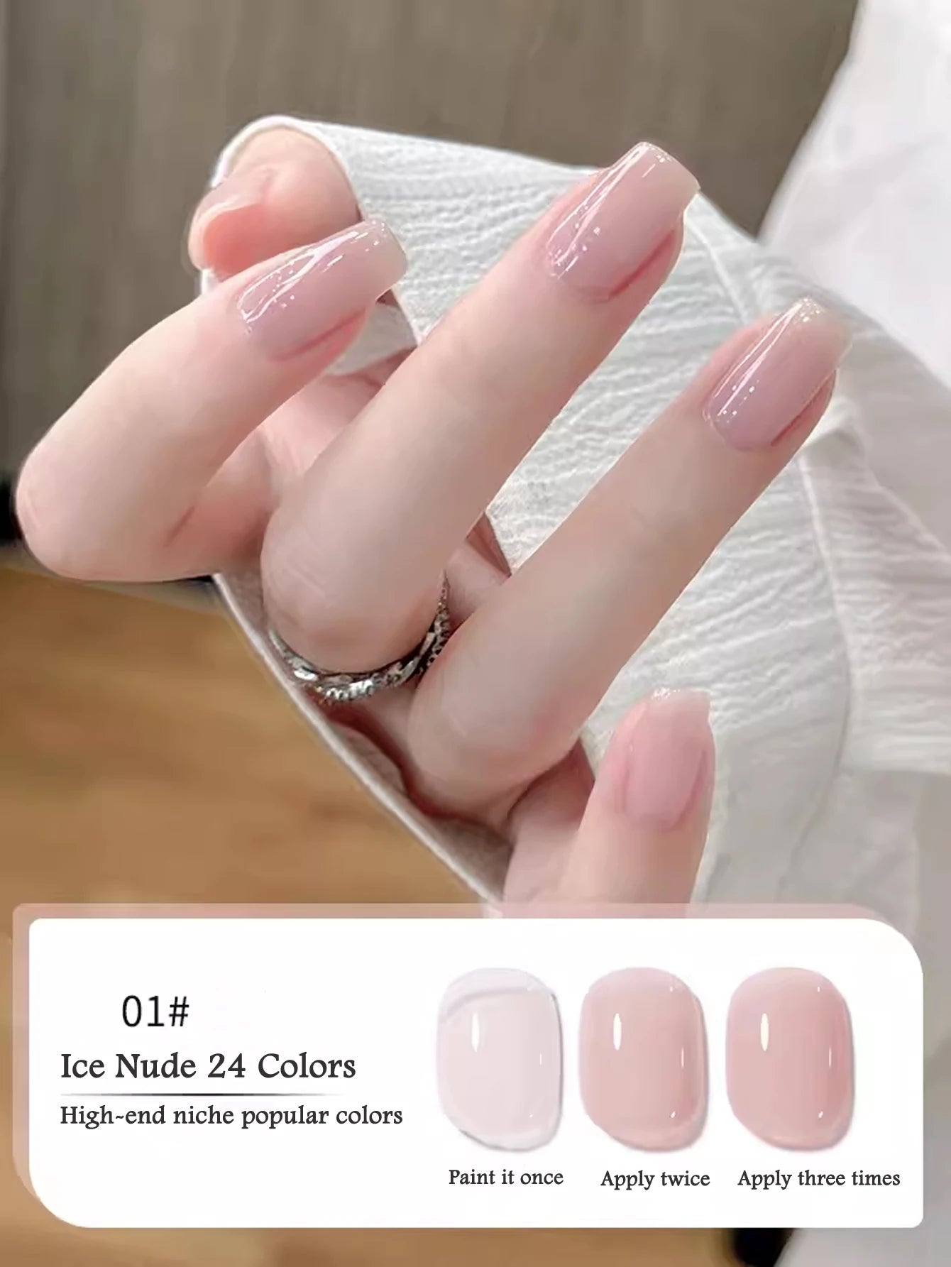 Hand with pink nail polish and color swatches labeled 'Ice Nude 24 Colors' on a neutral background.