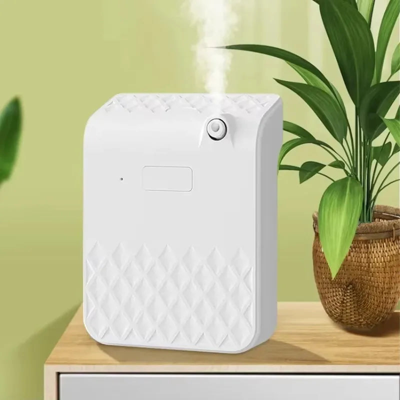 White textured humidifier on a wooden surface with a green plant in the background