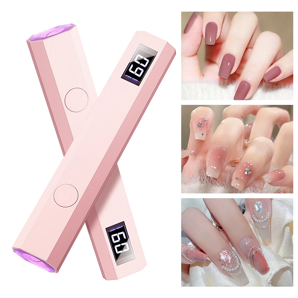 Pink nail lamp with digital display and images of nails with decorative designs.