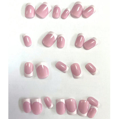 Set of pink and white nail tips on a white background