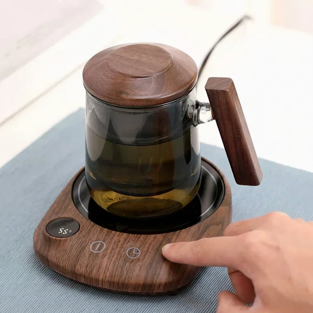 Glass mug with wooden lid and handle on a wooden base with control buttons, branded 'Luckima'.
