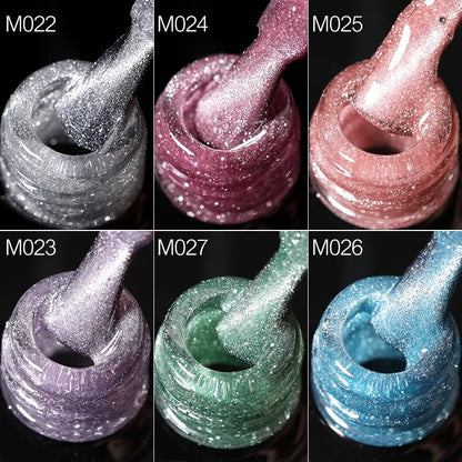 Collection of glittery nail polish swatches in various colors on a black background.