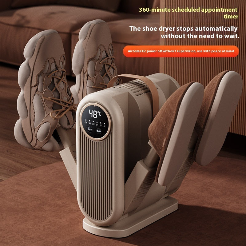 Shoe dryer with shoes on a wooden floor