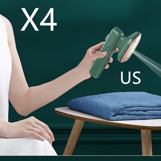 Person holding a green handheld device with 'X4' and 'US' text, over a blue towel on a table.