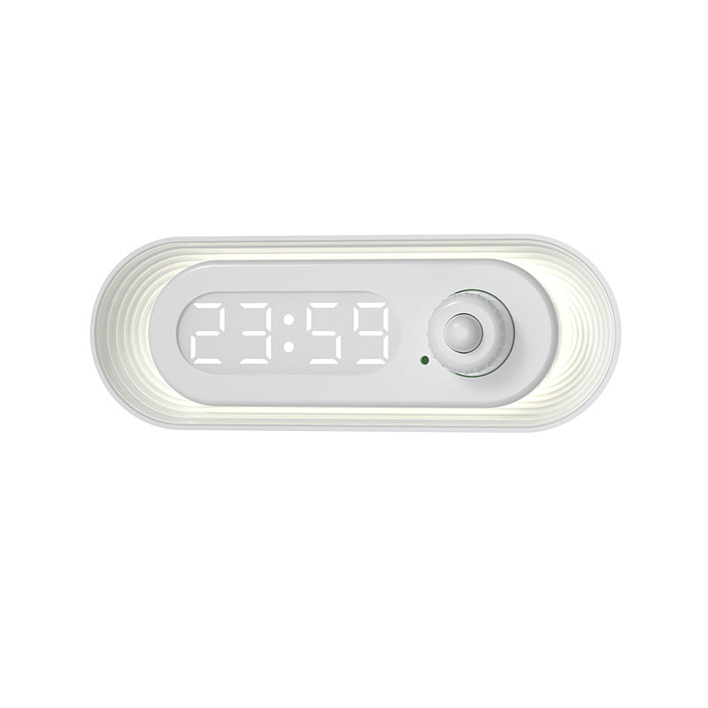 Digital clock with LED display on a white background