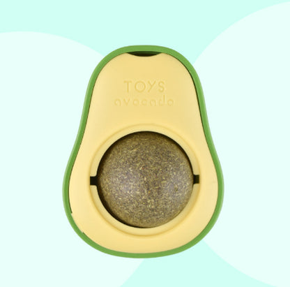 Avocado-shaped toy with a ball inside on a light green background