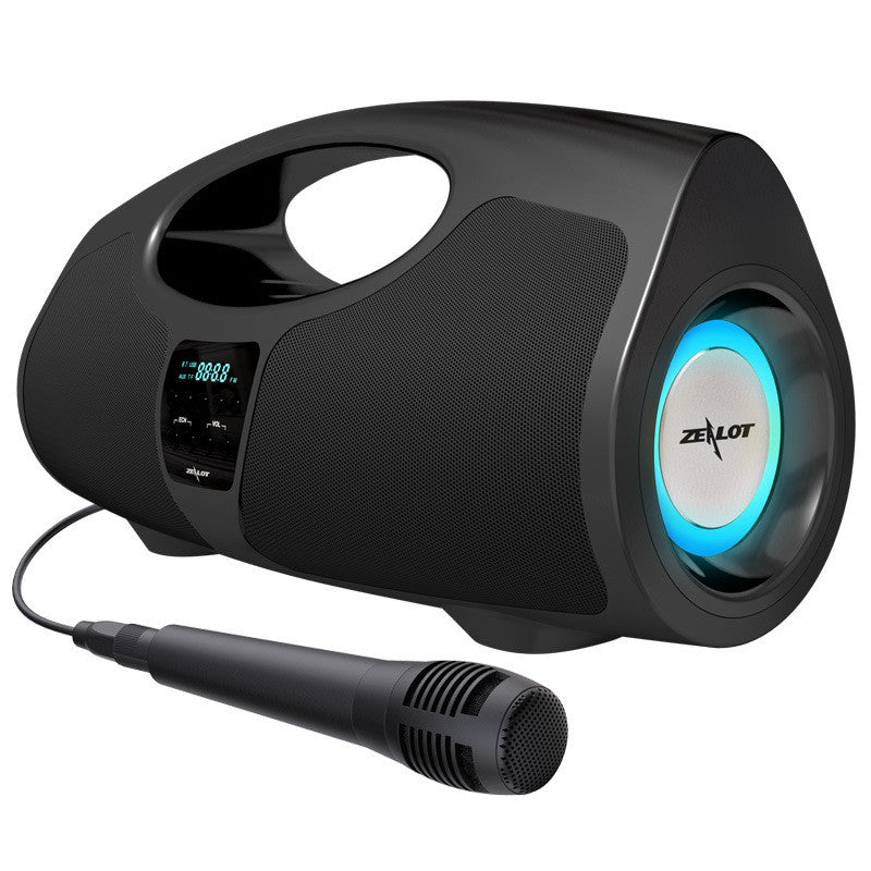 Black portable speaker with microphone on a white background, featuring the Zealot brand.