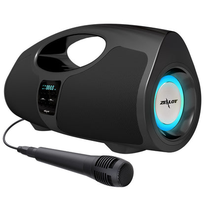 Black portable speaker with microphone on a white background, featuring the Zealot brand.