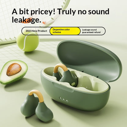 Ear Clip Bluetooth Wireless Headphones - Green wireless earbuds with charging case on a light surface with avocado and tennis ball.
