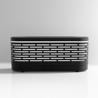 Black and white rectangular device with horizontal stripes on a light gray background