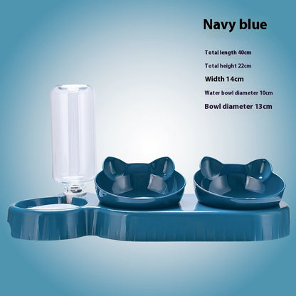 Navy blue pet water bottle and bowls set on a light blue background